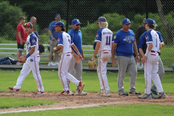 The Nonnewaug baseball team shakes hands after a win in the 2024 Class M state tournament. This offseason, the baseball and softball teams are starting to prepare for another season with voluntary workouts. (Courtesy of Noreen Chung)