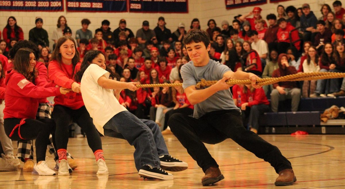 Nonnewaug freshman fight the juniors in a game of tug of war, During the 2025 Nonnewaug red our pep rally. 