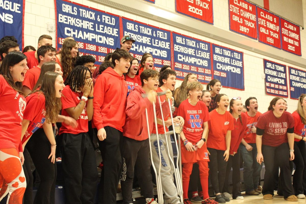 The senior class screams into the decibel meter to see which grade can reach the highest decibel at Nonnewaug during the winter pep rally on Feb. 7.