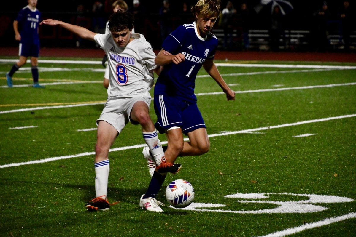 Nonnewaug's Josh Zapatka fights for the ball against Shepaug's Sonny Smith during a 2024 soccer game in Woodbury. Shepaug has been Nonnewaug's athletic rival since Lewis Mills left the Berkshire League in 2019.