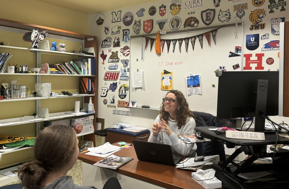 Nonnewaug College and Career Resource Center counselor Kathy Green, right, talks post-secondary plans with senior Alyssa Gravel on Monday in the CCRC.