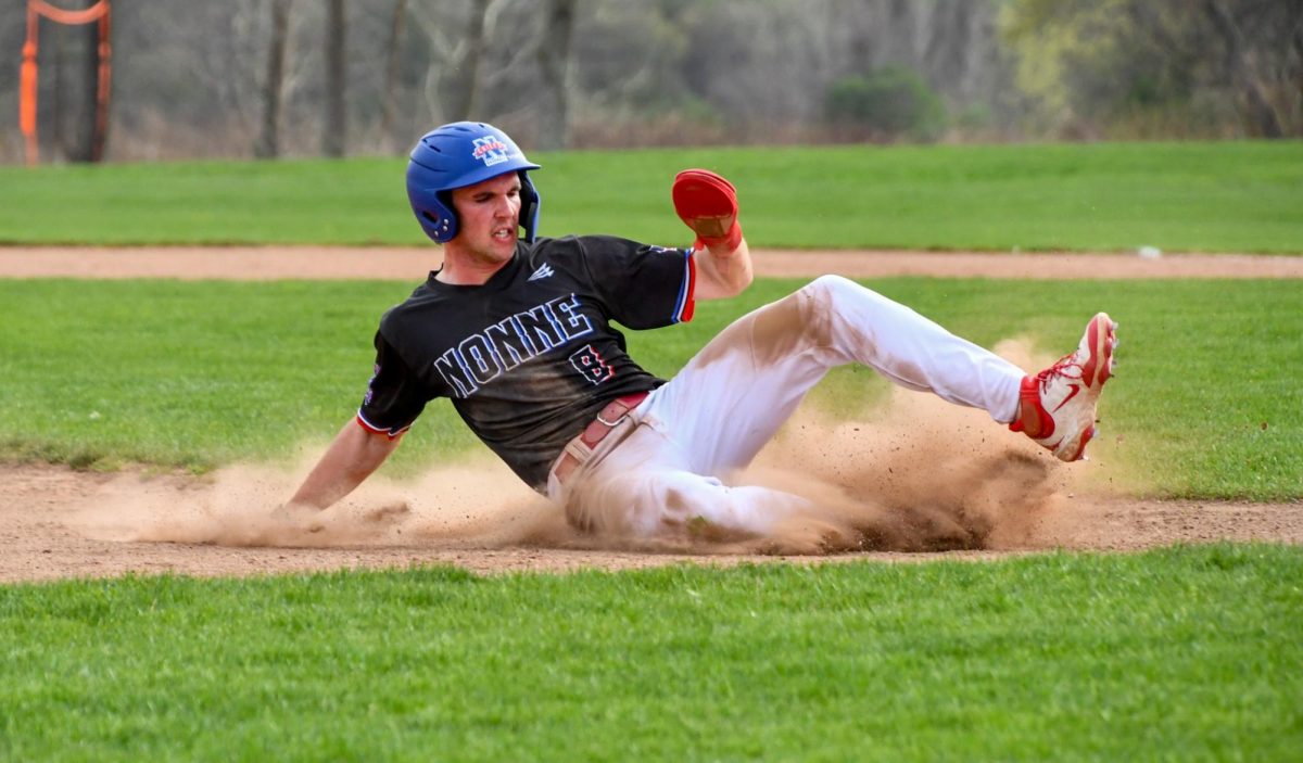 Brayden Whipple slides into third base on April 25 during the Watertown vs. Nonnewaug baseball game. The Chiefs won 6-2.
