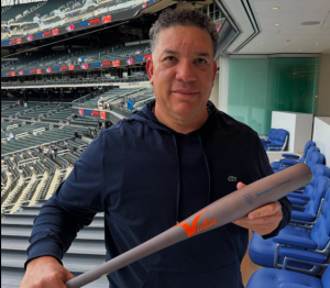 Bartolo Colon, former MLB pitcher, holds his custom made Mets torpedo bat. While torpedo bats have taken the MLB by storm, what impact could they have at the high school and college level? Photo credit:@baseballquotes1 on twitter/x