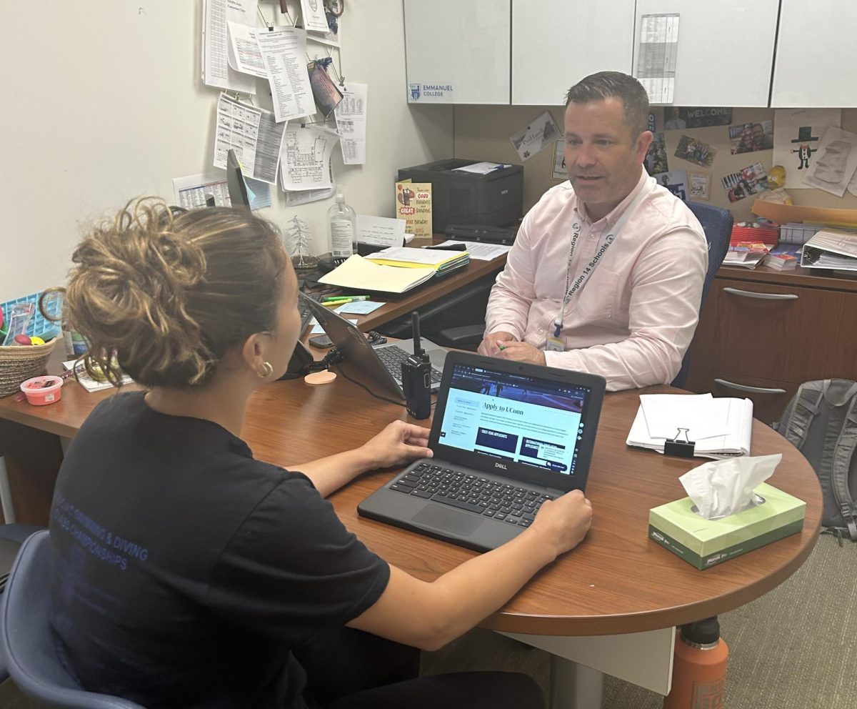 An NHS student discusses her college application with her counselor, Paul Ladke. With the applicant pool growing more competitive it is imperative that you utilize all tools at your disposal in order to maximize your chances of being accepted into your dream school.