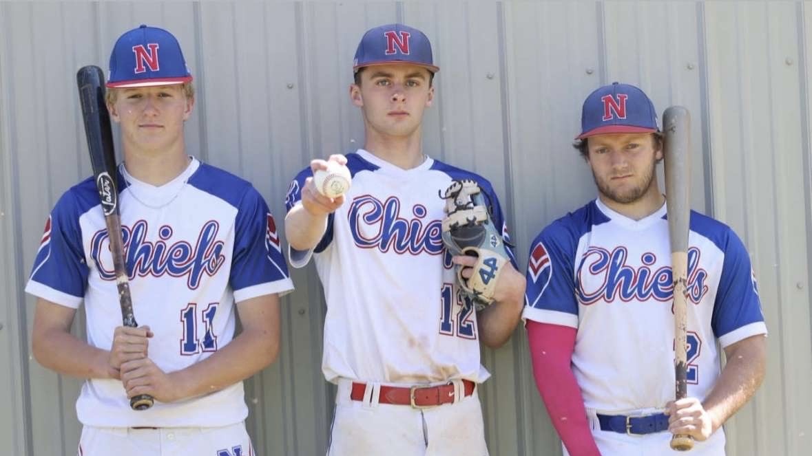 From left, R.J. Barksdale, Trevor Santopietro, and Matt Dutton pose for a senior picture. (Courtesy of Noreen Chung)