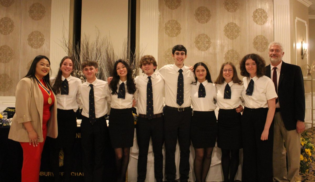 Chapter advisor Leanne Foster, far left, and assistant advisor Eric Birkenberger, far right, pose with the 2024-2025 Woodbury FFA Chapter officers, from left, Christa Freel, Connor Cabeleira, Mia Layseca, Nathan Berry, Luciano Pedros, Merije Iljazi, Abegail Diezel, and Isabelle Longley at the Grand Oak Villa on May 22 for the annual banquet. This marks the end of their term as the chapter welcomes a new officer team. (Courtesy of Kyleigh Paige)
