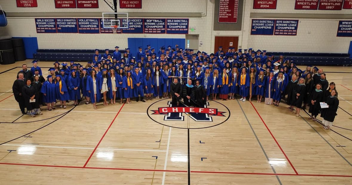 Nonnewaug 2024 graduates pose in the gym prior to graduation. This group of students was similar to class of 2025, diverse in passions shown by all the different achievements represented. (Courtesy of Nonnewaug High School/Instagram)