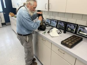 Russ Wabuda, known as “Mr. Fix it,” helps the aquaculture class by fixing the koi pond pump to keep the pond running efficiently. To master a skill like this only comes with time and experience which Wabuda has a lot of. 
