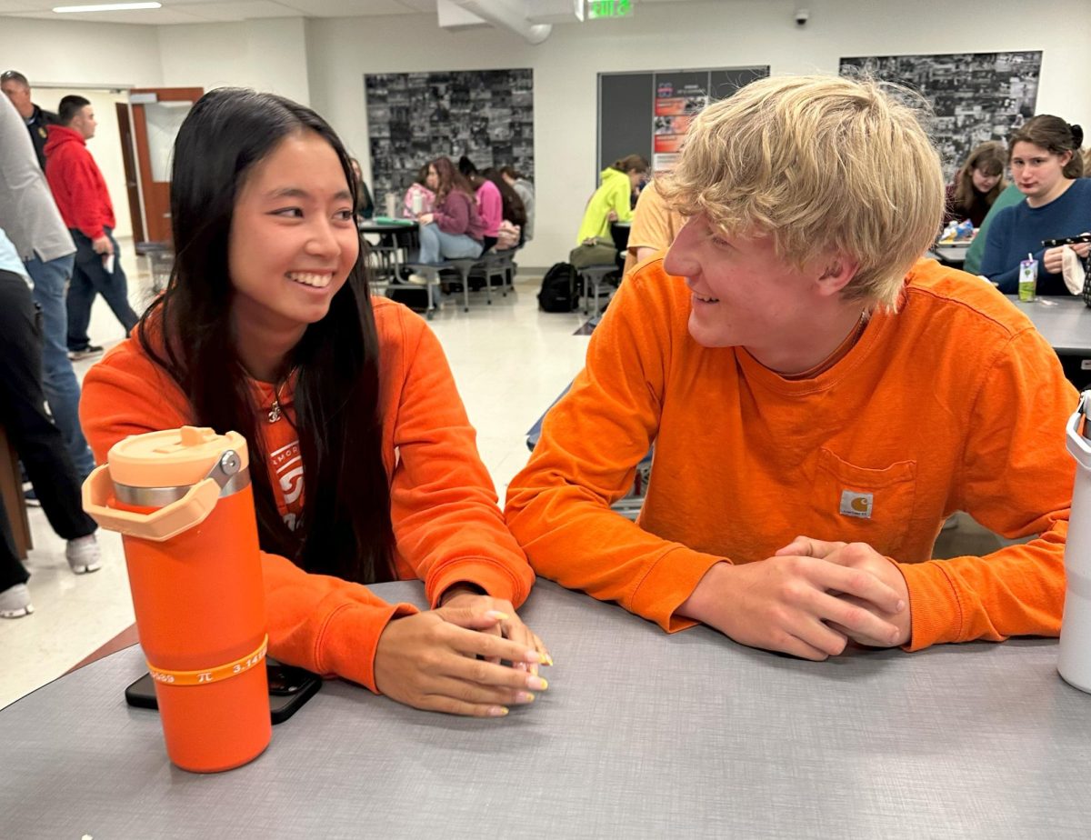 Ellie McDonald, left, talks to R.J. Barksdale about senior memories during lunch.