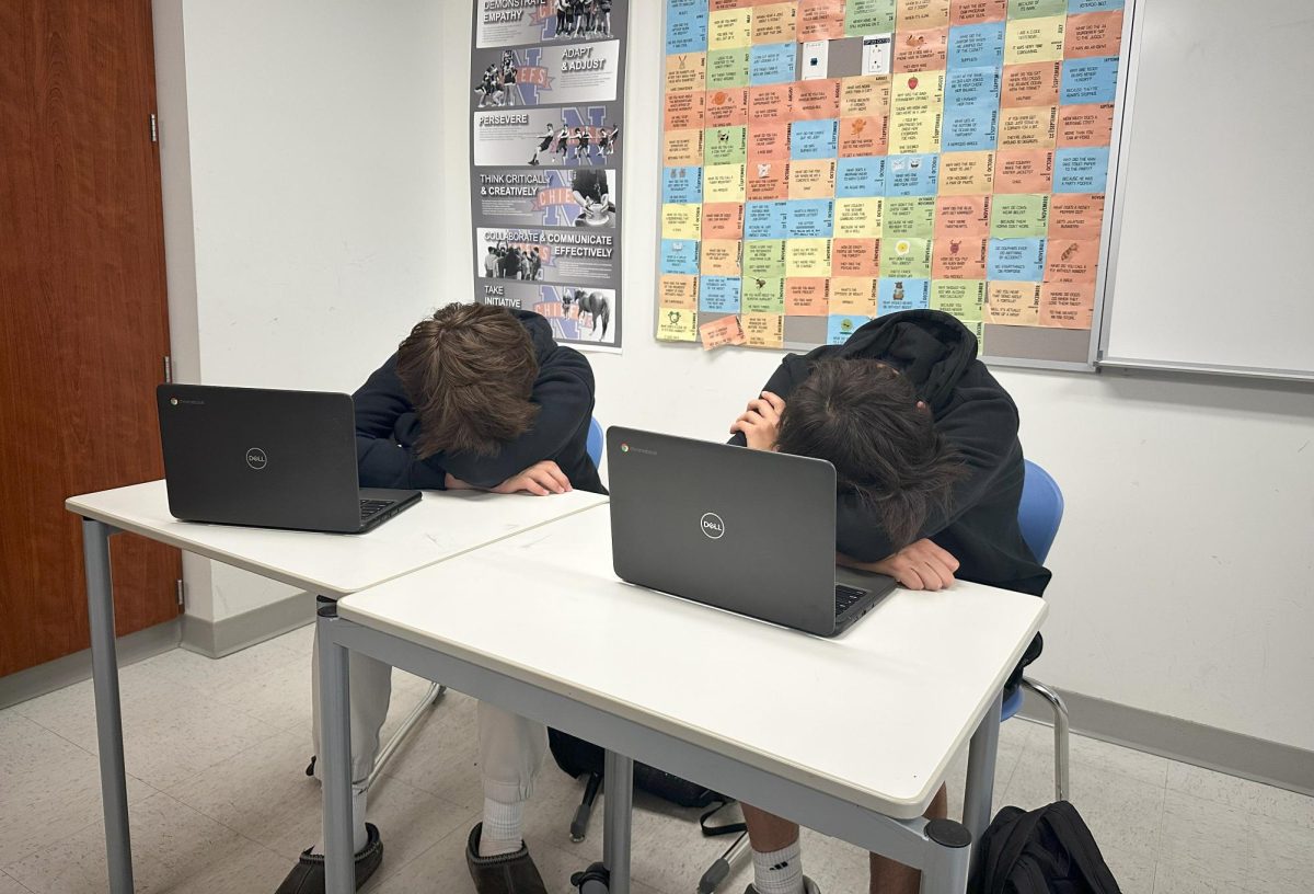 Max Sorcher, left, and Isaac Spagnola sleep during class.