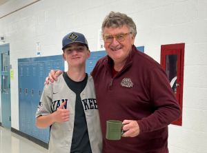 Woodbury Middle School building sub Sean Butterly, right, poses with Kamden Blackman. (Collin Humowitz '29)