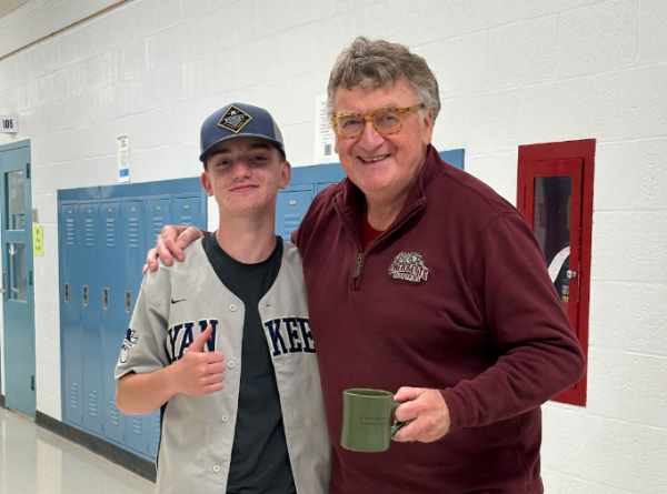 Woodbury Middle School building sub Sean Butterly, right, poses with Kamden Blackman. (Collin Humowitz '29)
