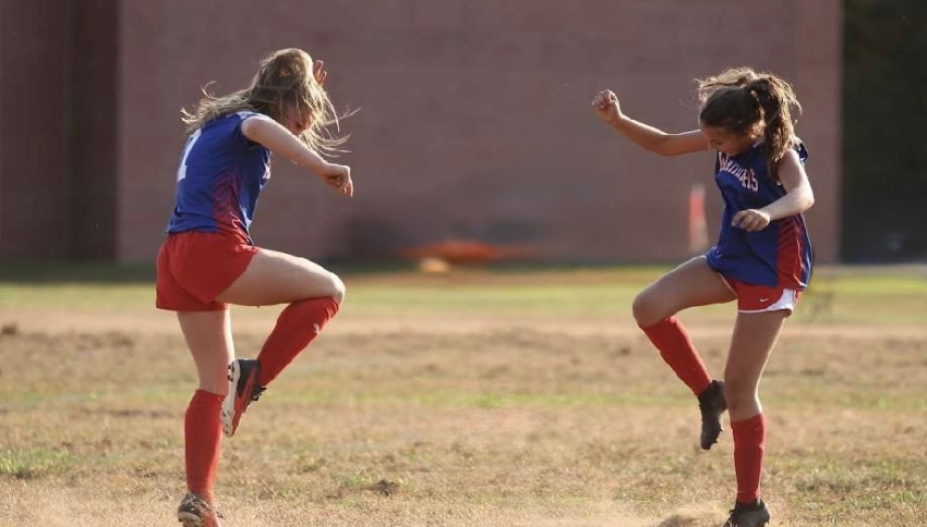 Soccer players celebrate during their last soccer season together. (Courtesy of Kelly Packett)