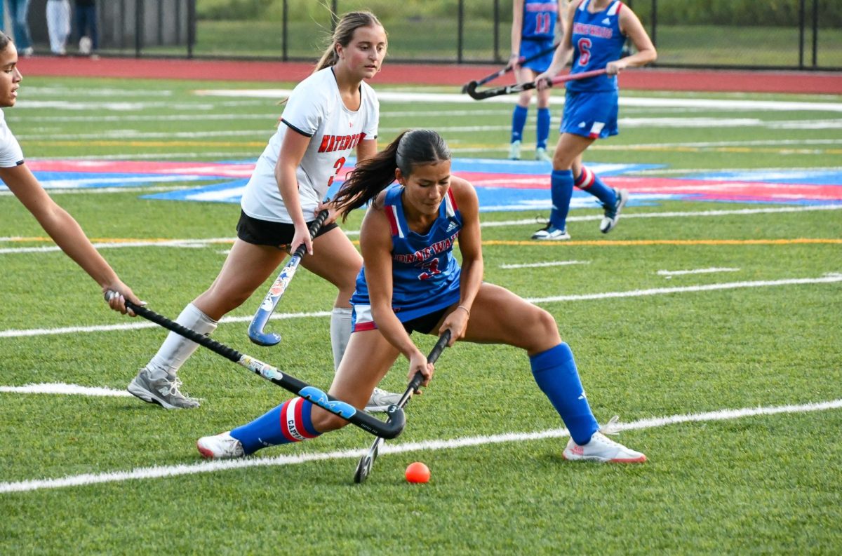 Sophia Garguilo (3) push passes the ball to her teammate on September 3 against Watertown. The Chiefs won 4-0. 