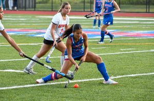 Sophia Garguilo (3) push passes the ball to her teammate on September 3 against Watertown. The Chiefs won 4-0. 
