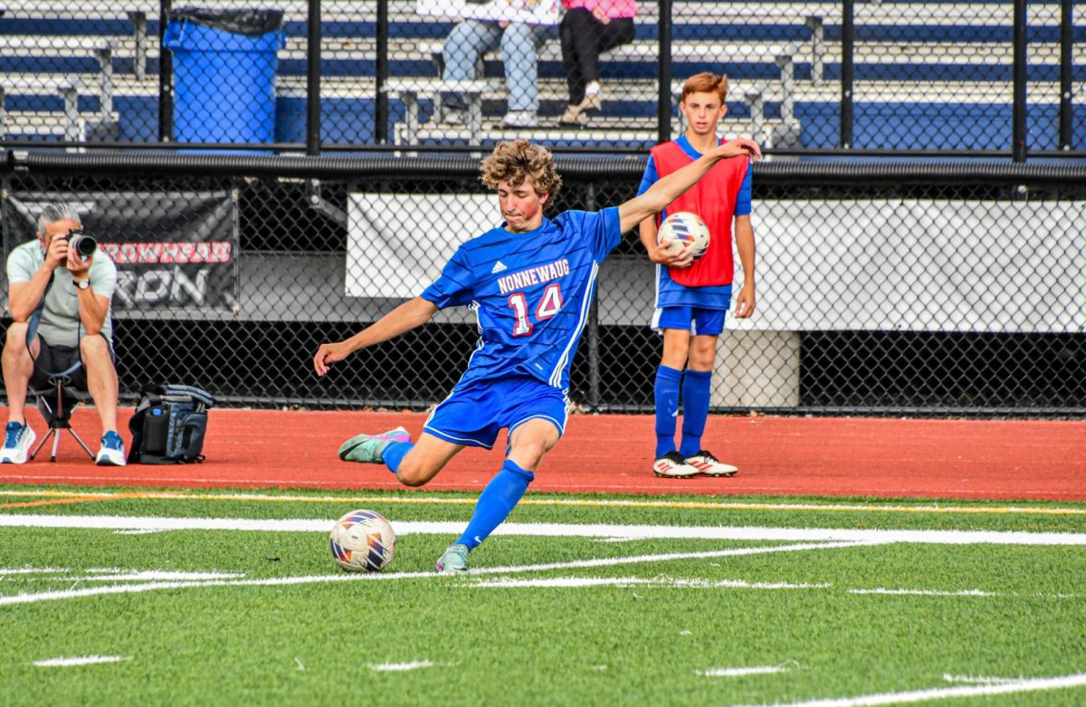 Dylan Diezel (14) kicks the ball to a teammate on Sep. 5 against the Lakeview Bobcats. The Chiefs won 2-0.