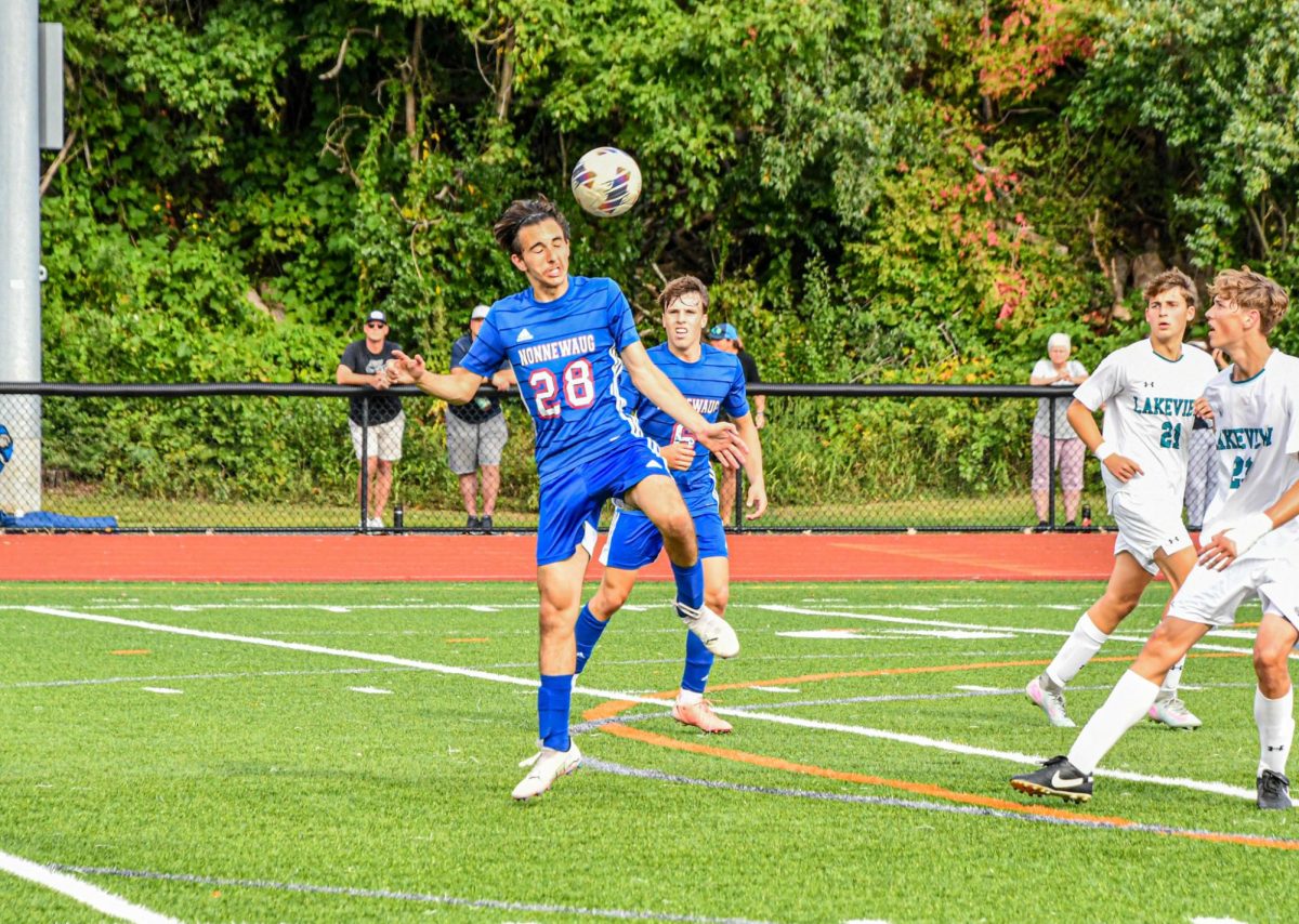 Viincenzo Rose (28) heads the ball on Sep. 5 against the Lakeview Bobcats. The Chiefs won 2-0.