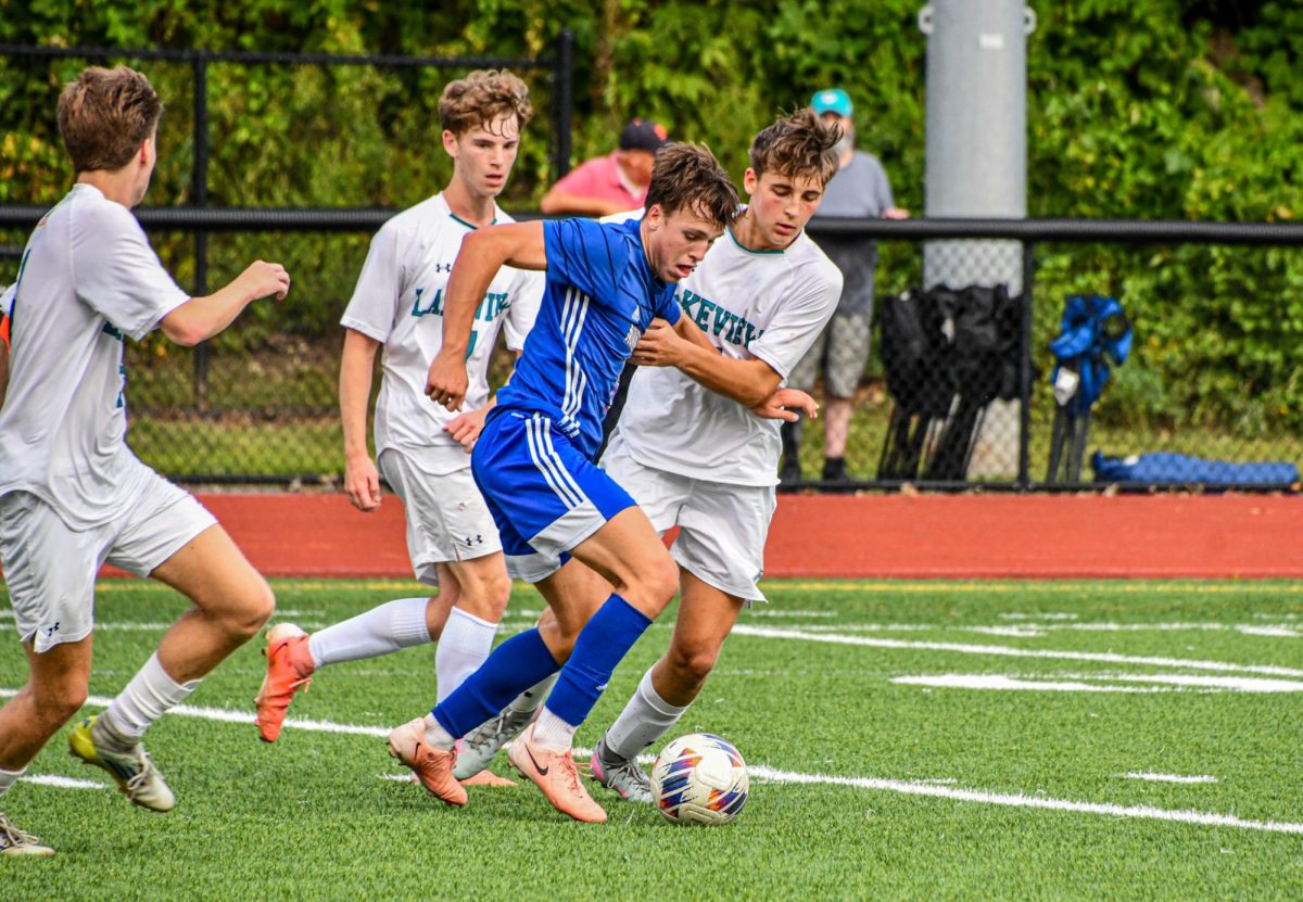 Jake Cenatiempo (6) defends the ball from the opposing players on Sep. 5 against the Lakeview Bobcats. The Chiefs won 2-0.