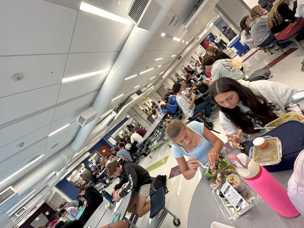 Students enjoy their lunch and catch up with friends on Sept. 25th in Nonnewaug High School's cafeteria. (courtesy of Jayda Gladding)