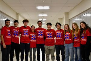 From left: Everett Pierce, Luciano Pedros, Billy Herr, Boe Stokes, Brayden Whipple, Jonathan Cheung, Scott Viveros,  Maia Colavito, Grace Rubacha, and Ella Quinn pose during the annual Red Out on February 7, 2025. Last year’s LLS team led by Whipple and Herr ended in success, as they raised the most money in the state, named student visionaries of CT. (Courtesy of LLS Facebook Page)