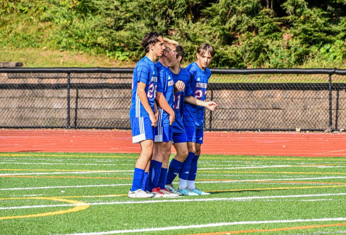 NHS boys soccer making a wall to defend a free kick from Lakeview boys soccer to tie the game on Sep 5th. 