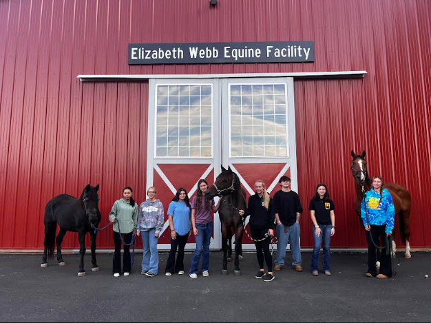 Woodbury’s FFA welcomed a new horse (Rock) on Sept 15th. Group photo of class and horses, Buddy (left), Rock (middle), and Scottie (right).