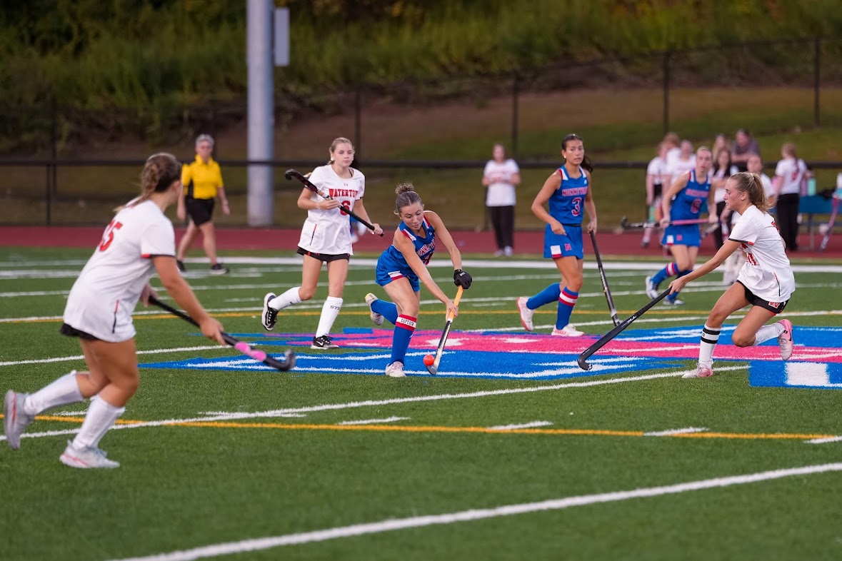  On the night of September 3rd Anna Crocker (4) interrupting a pass from a player from Watertown. Crocker in one of four seniors who have grown the program from a mere two wins during their freshman season to a team contending near the top of the Berkshire League. (Photo Credit - Jason Scozzafava)

