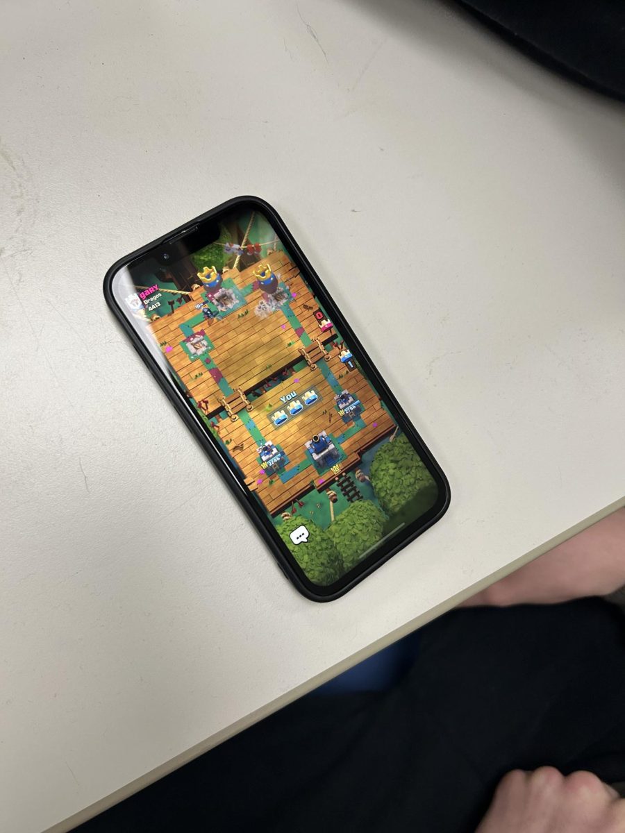 Senior Sebastian LaChance wins a game of Clash Royale by taking all three of his towers (three crowning).
