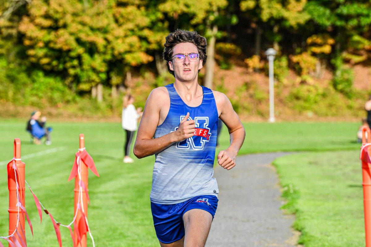 John Carrara finishes his race at the Cross Country meet against Northwestern and Shepaug on Sept. 30. 