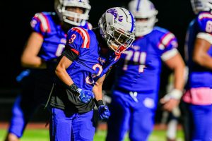 Derek Chung celebrates after a touch down gaining a point for NHS on Oct. 24 during the NHS vs. Notre Dame prep game. The Chiefs won 35-32.