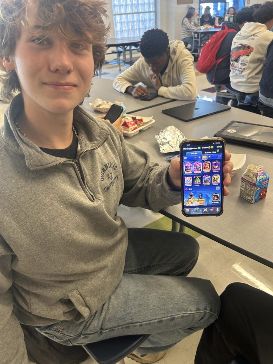 Senior Dylan Loring with one of his Clash Royale decks, Like many other Nonnewaug students Loring frequently plays Clash Royale. 
