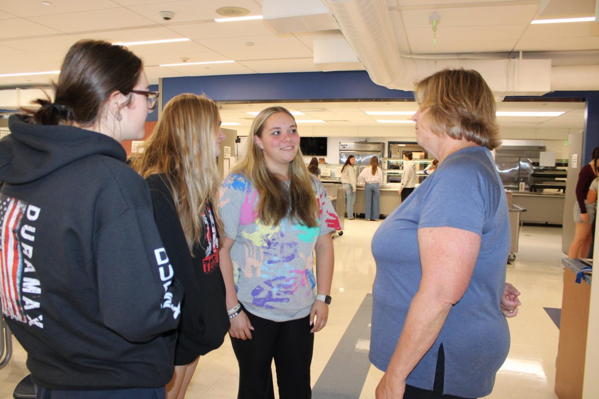 Nonnewaug’s social worker Shaoron Gomes talks to a group of FFA students from a variety of sending towns. As the calendar turns to mid-October, out-of-district students have already found their place on their new campus. 