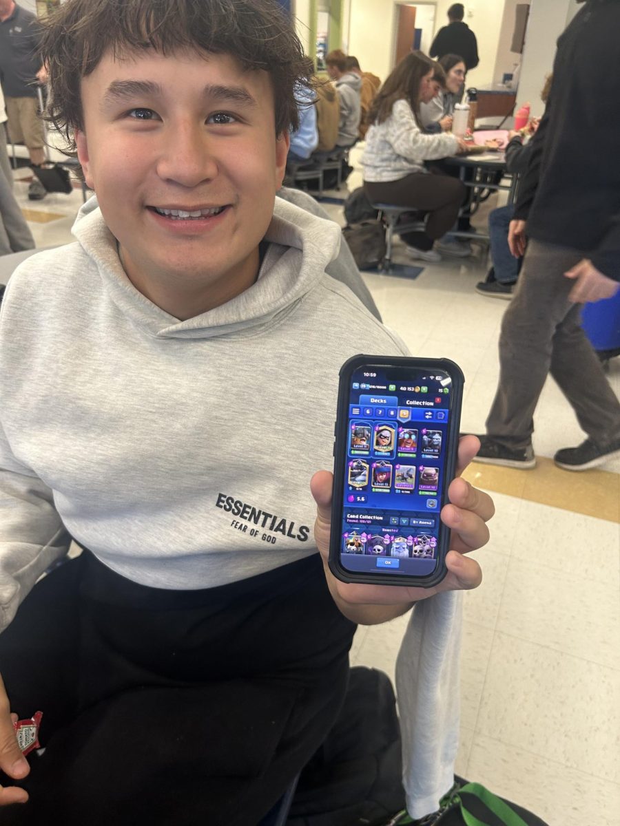 Senior Jonathan Cheung with his Clash Royale deck. 
