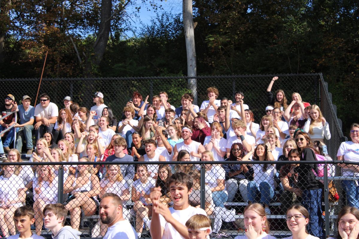 The senior student section cheers for their peers. The next moment, a point was scored for their team at the fall 2025 pep rally games.  