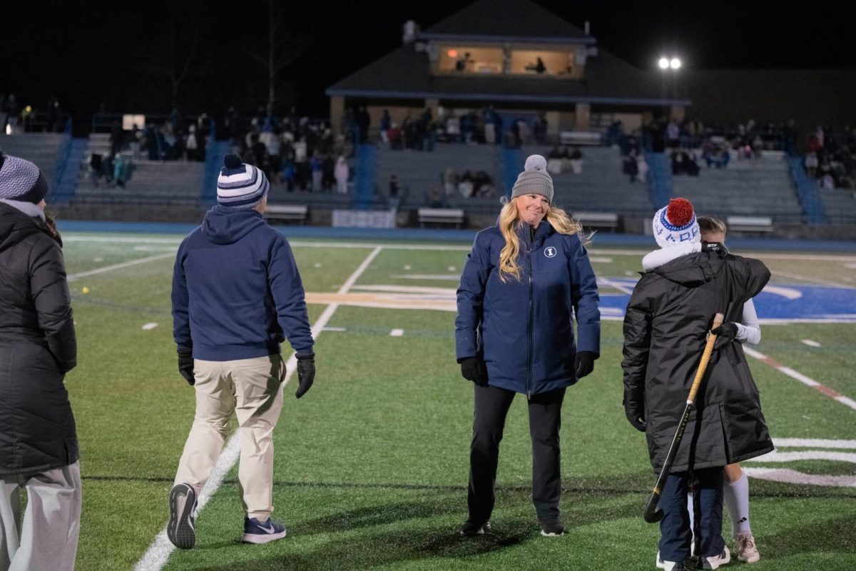 Anna Crocker embraces coach Janet Crocker after falling 3-1 to Immaculate in the field hockey state semifinals. (Courtesy of Anna Crocker)