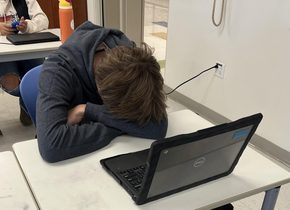  Junior boys soccer player Rolfe Brindle sleeps in his period one class after a night game victory over Shepaug in the Berkshire League finals.