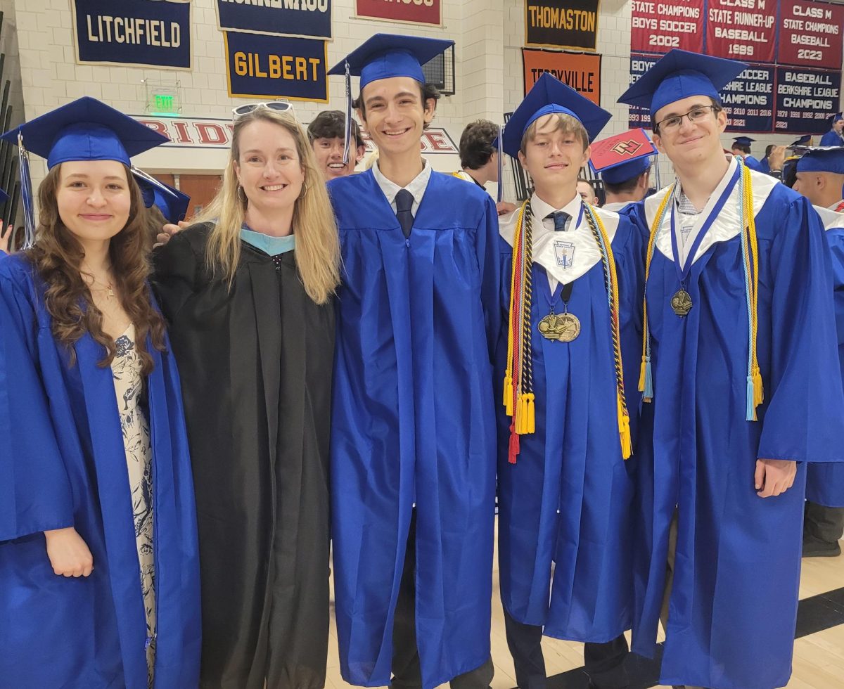 From left to right, Ana Mylus, Rebbeca Tzraski, Mason Norris, Alex Tracy, Micah Tract pose after June's 2025 graduation. Throughout Trzaski's tenure at NHS she continues to personify the values of NHS as one of campus' hardest working faculty members. (Contributed)