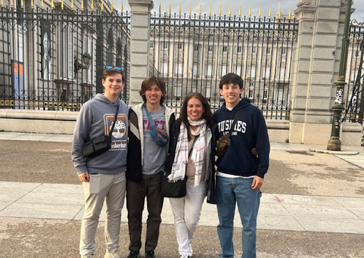 From left, Noah Sapack, Gavin Sandor, Karen Sandor, and Liam Sandor while on the Spain trip visiting Seville. Under Karen Sandor's leadership, she provided more two dozen students an unforgettable trip abroad last spring. Experiences like these personify Sandor's desire to bring her courses to life for NHS students. (Photo Credit - Contributed)