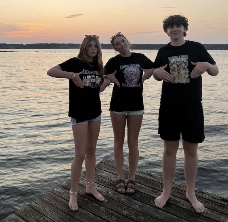  From left to right, Lily Rich, Riley Rich and Billy Herr wear “brainrot” shirts. Rich wears a Labubu shirt, showing her love for the toy. (Courtesy of Lily Rich Instagram.)