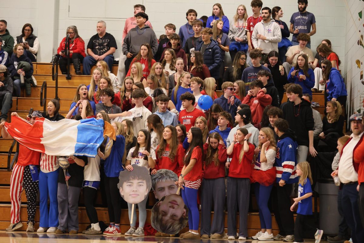 Nonnewaug Highschool students gather at the away game, at Shepaug Valley High school to support the Cheifs. Students dress in red, white, and blue to collectively show spirit
(Courtesy of Noreen Chung)