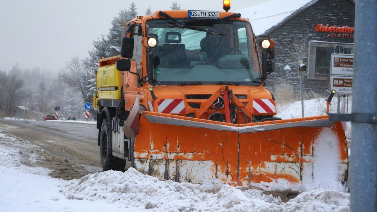 A snow plow cleans snow off the road in hopes to make the roads safe for travel. When it snows, all schools must take into consideration impacts on travel - which may cause delayed openings, school closures, or early dismissals. (Photo Credit - Jonas Augustin)