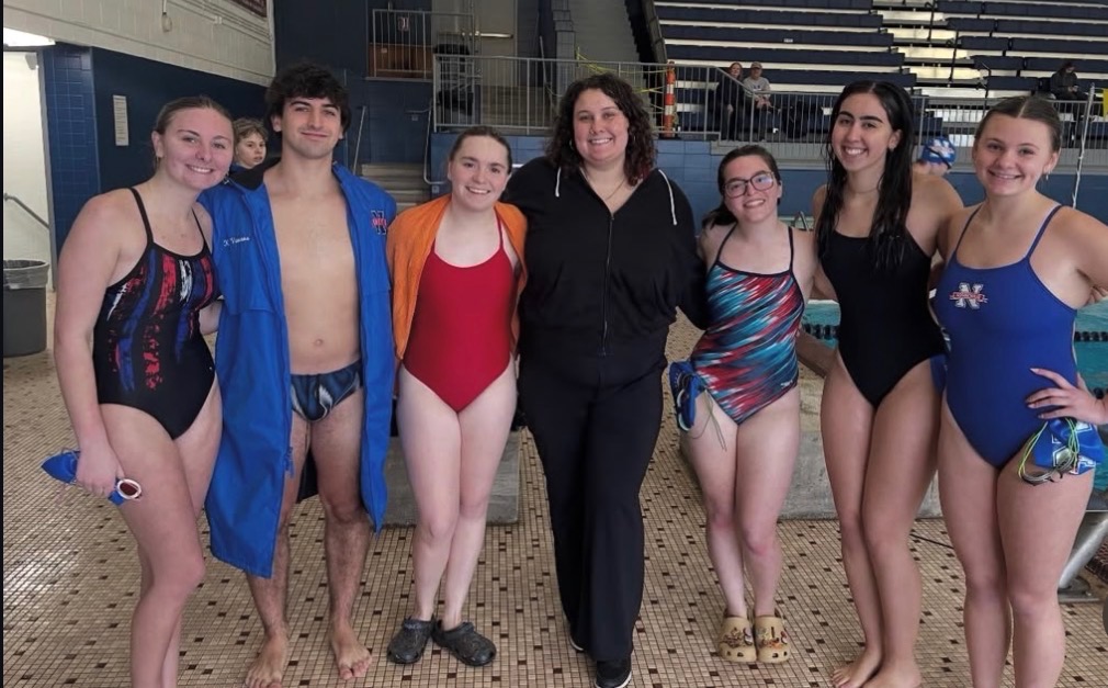 Former NHS Swimmers had the opportunity to come back to JFK High School where the team practices. The current team held a mock meet where they had the opportunity to swim against current NHS swimmers. (Contributed)