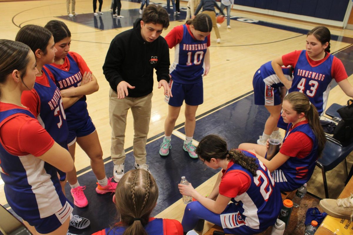 JV Coach Zach talks to the Nonnewaug team at half time at the Shepaug game on January 9, 2026.
