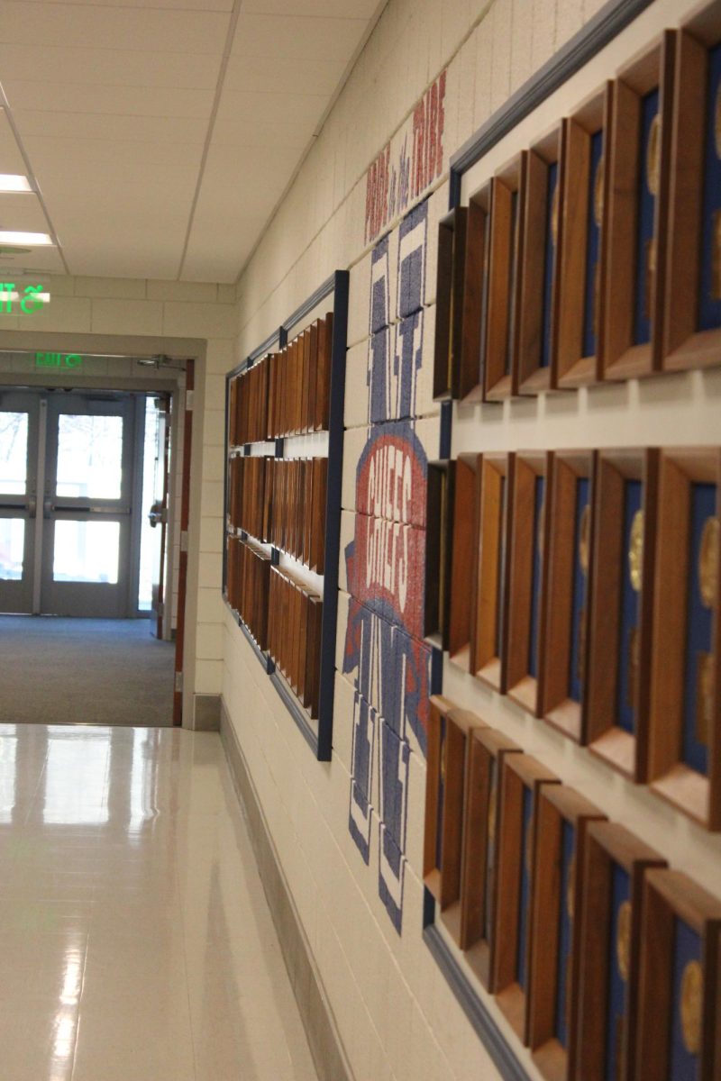 Decades of Nonnewaug athletics history hangs proudly in the hallway outside of the gymnasium. The plaques embed years of past Berkshire Leauge Champions.