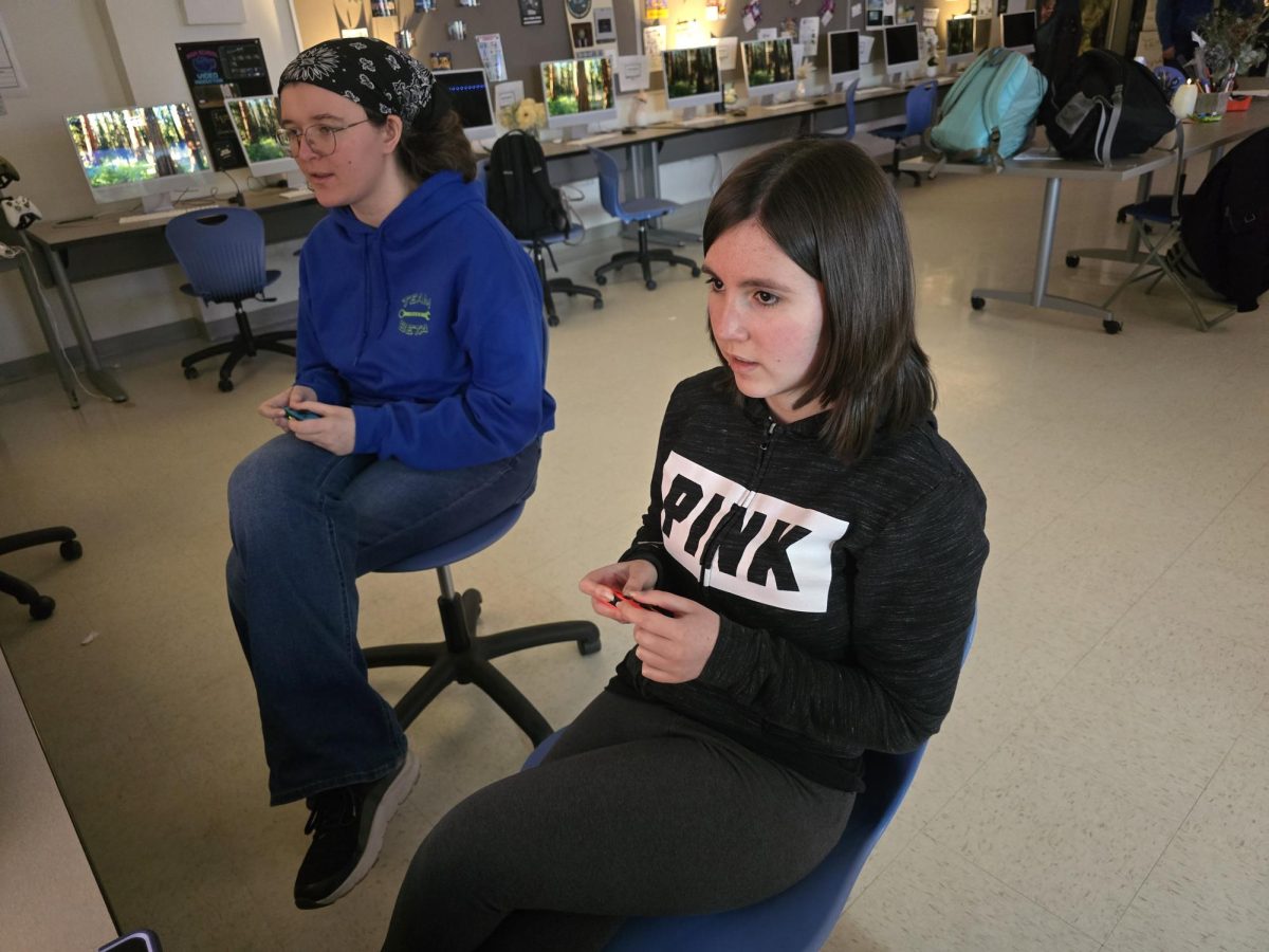 Isabelle Longley (left) and Delia Coelho participate in a Super Mario Kart race during a competition. Both competitors have been greatly enjoying the new optic fiber internet connection provided to them by the school.