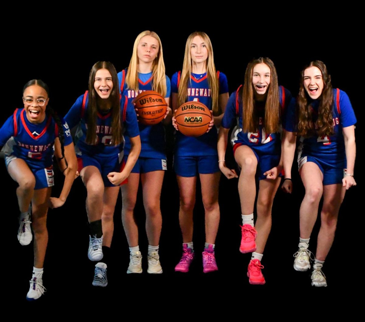 The Nonnewaug girls basketball team poses during their media day.