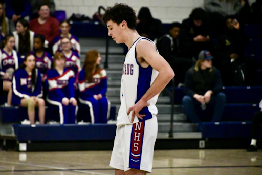 Lincoln Nichols, a 2025 graduate of Nonnewaug High School stands at the free throw line preparing to take a shot. Like him, many athletes are stressed out or feel pressure during sports games, with many of the main reasonings being current academic stress. (Deme Jones)
