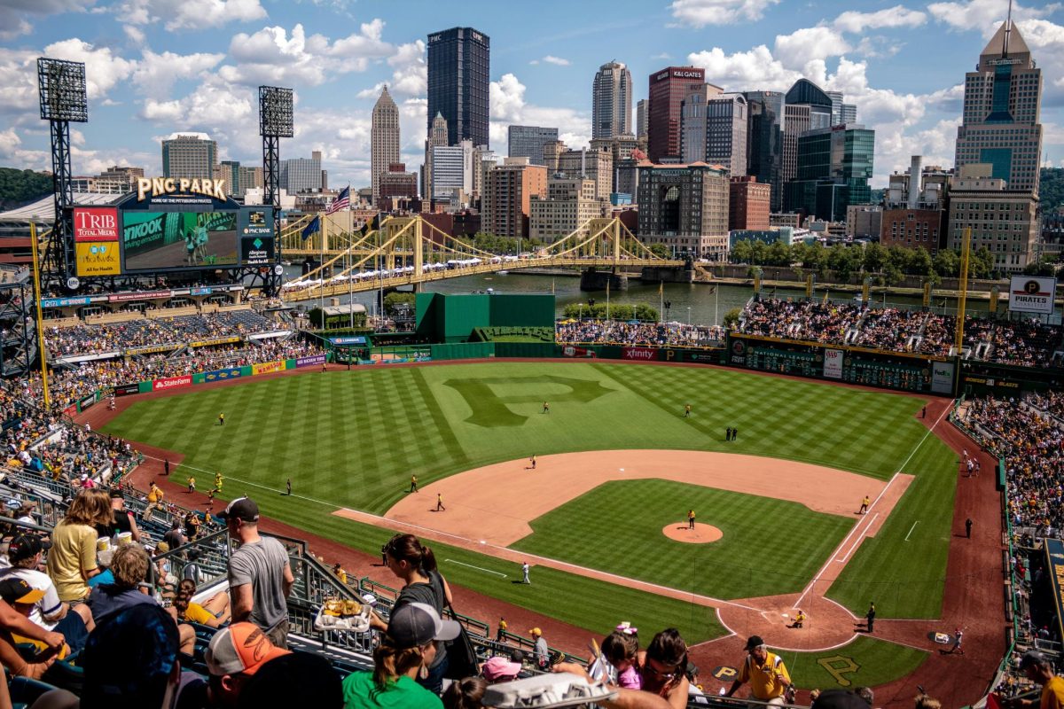 The Pittsburgh skyline creates a beautiful view behind the baseball fiend at PNC park. The Pittsburgh Pirates are ranked 22nd in payroll with $120.7 million, according to Spotrack, a dollar figure that places them among the bottom of the league and in desperate need of a more level financial playing field. (Photo Credit - Unsplash - Joshua Peacock)