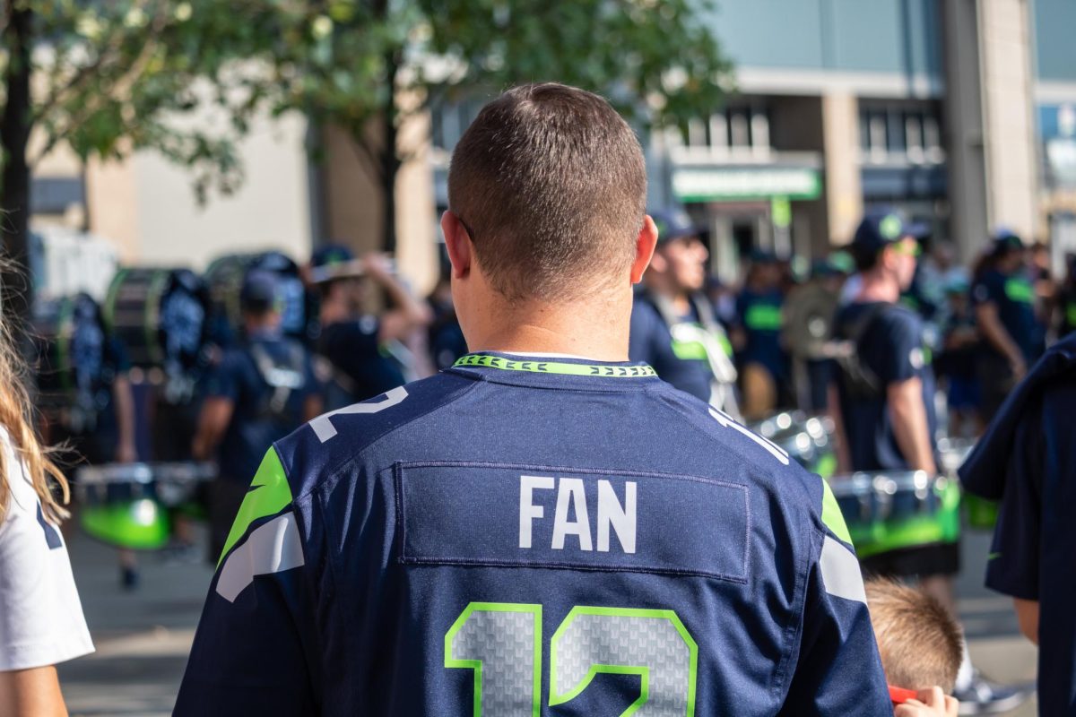 Pictured is a Seahawks fan heading into a game. The Seahawks recently won the Superbowl in February 2026. Because they won the Superbowl they have the 32nd pick in the draft, but good prospects could still fall to them. (Photo Credit - Shutterstock)