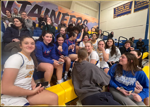 On January 20, 2026, before playing each other, players from Nonnewaug and Housatonic hang out between game breaks during a tournament at Housatonic Valley Regional High School.